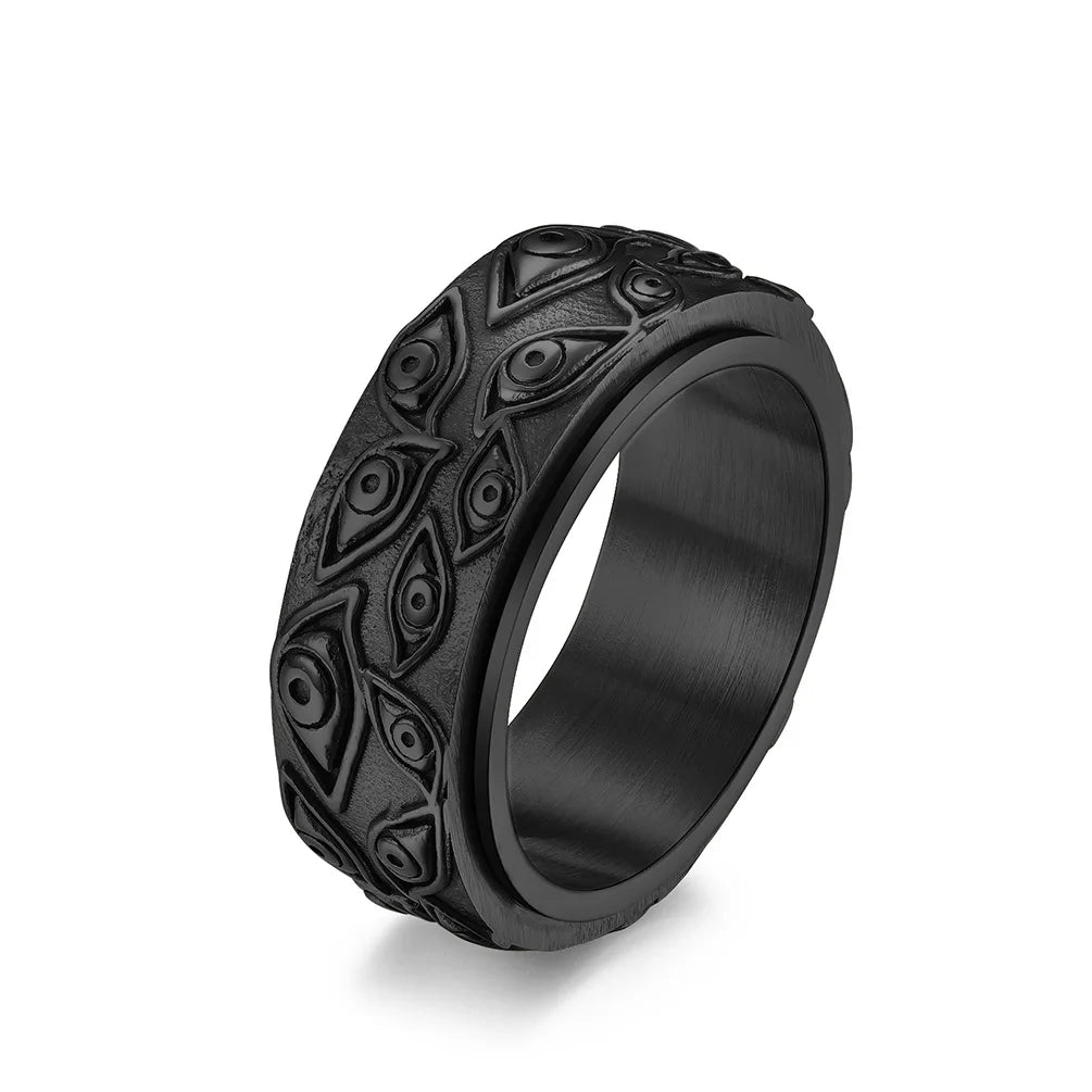Ring featuring an eye-inspired carved design and durable stainless steel construction.